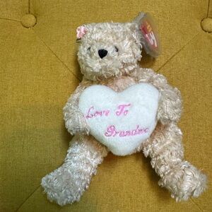 Ty beanie baby Beige Plush Bear Holding White Heart with Pink Embroidery.